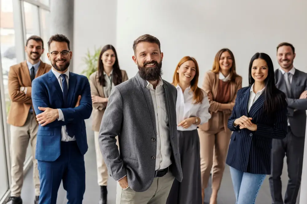 Magnolia Alliance Royal careers - team posing together in office